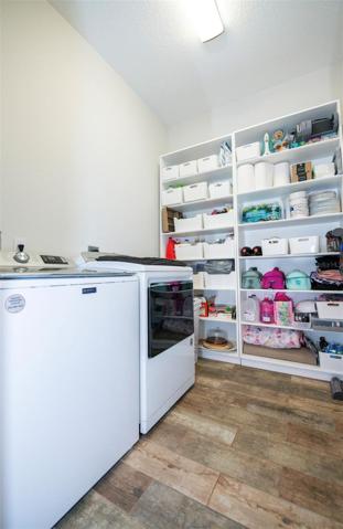 SIZEABLE LAUNDRY ROOM - Plenty of Storage Throughout the Home.