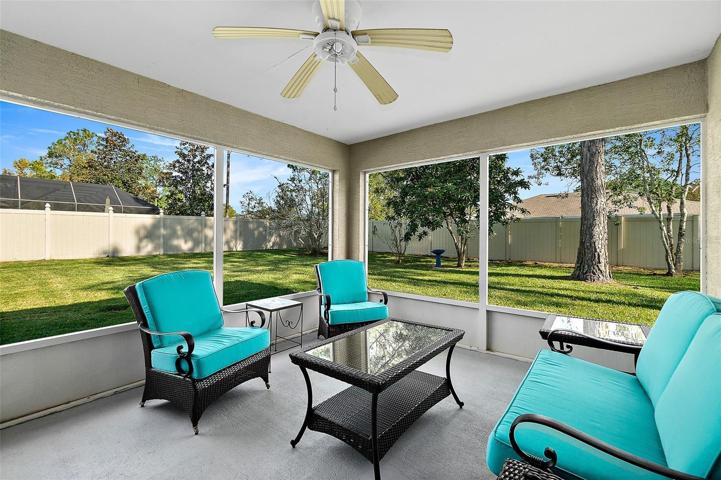 roomy screen porch overlooks fenced yard!