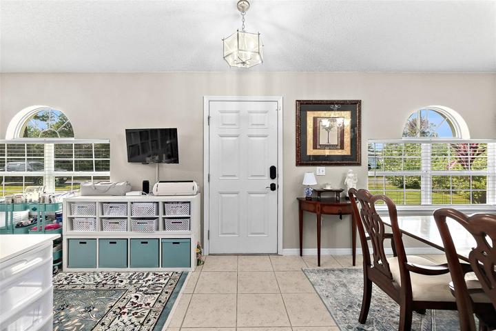 Front entry, with formal living room, dining room used as craft room. Use as you wish!