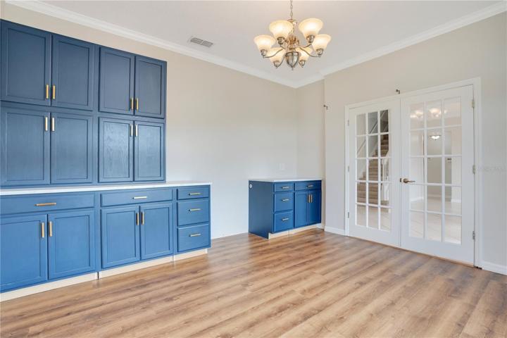 Working from Home? We got you covered with a large first floor office or den with built-in cabinets.