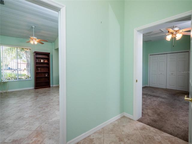 Extension with Bedroom on Right and Enclosed Porch/addition on Left
