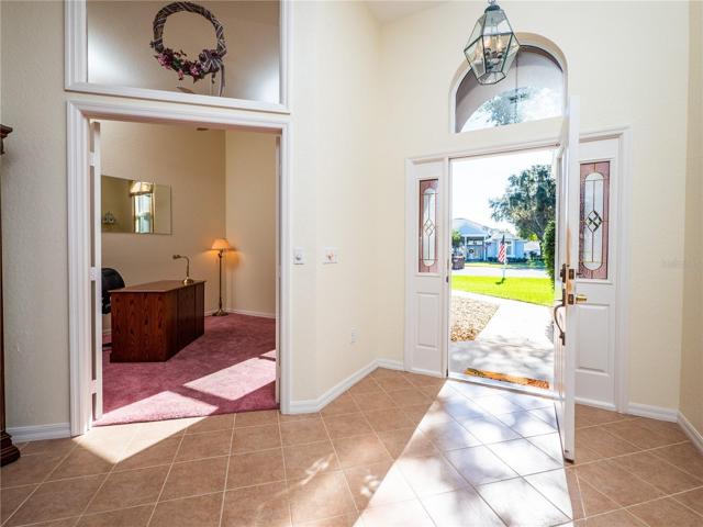 Front Foyer looking outside and into Office