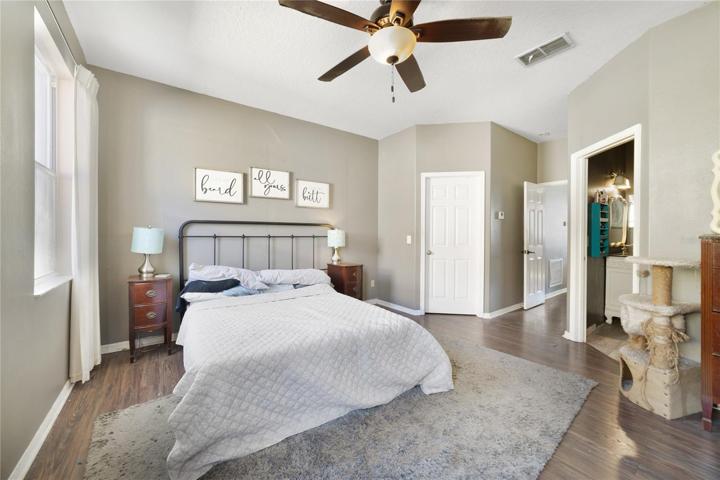 Escape the day in the generous OWNER’S SUITE offering a cool color palette that compliments the abundant natural light, WALK-IN CLOSET and private en-suite bath that delivers SPLIT VANITIES, a soaking tub and separate shower!