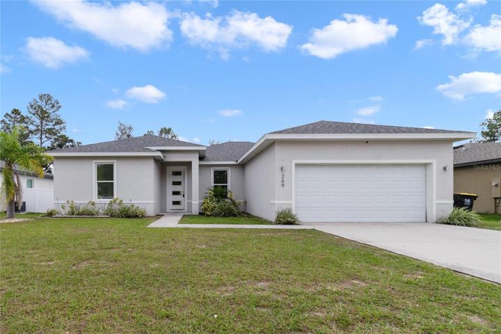 Poinciana Villages home built in 2019 with a bright OPEN CONCEPT, desirable kitchen finishes, WOOD LOOK TILE FLOORS THROUGHOUT, a spacious backyard and all the great AMENITIES Poinciana Villages is known for!