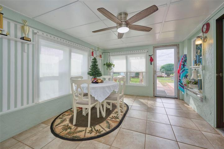 Florida room with access door to back yard