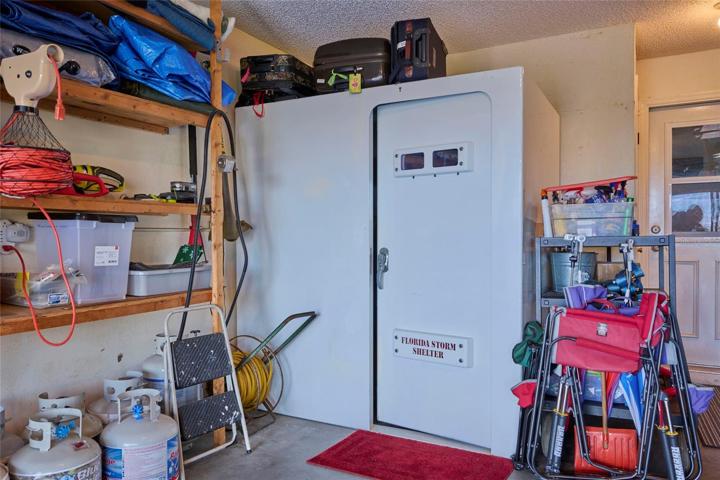 Storm shelter located in the garage