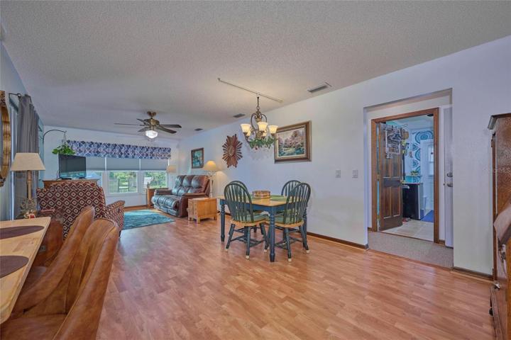 Family and dining room.  Doorway to right leads to laundry room, guest bath and bedroom 3