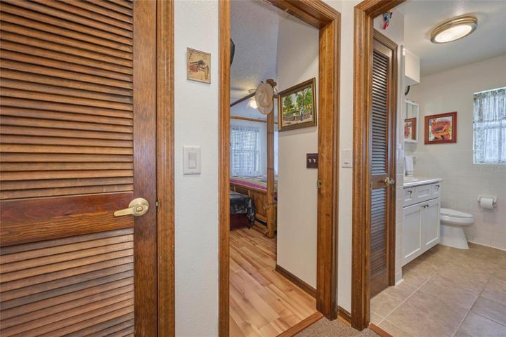 Guest bath with peek into guest bedroom