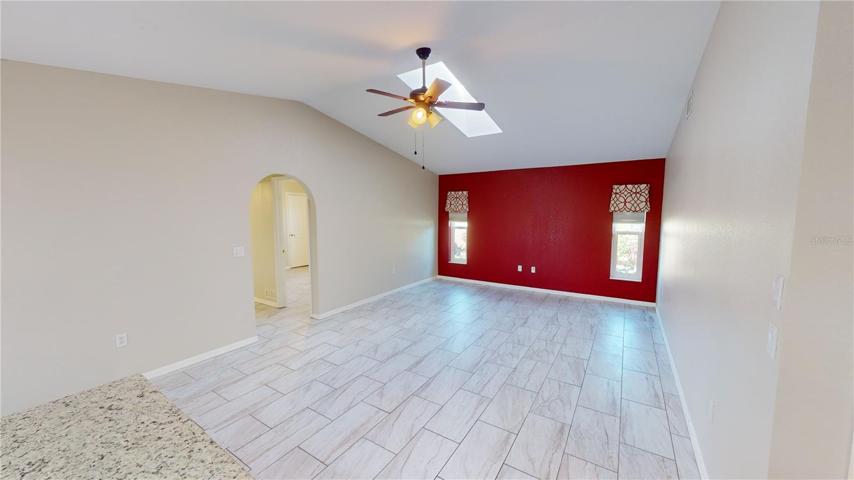 Family room off of kitchen with skylight