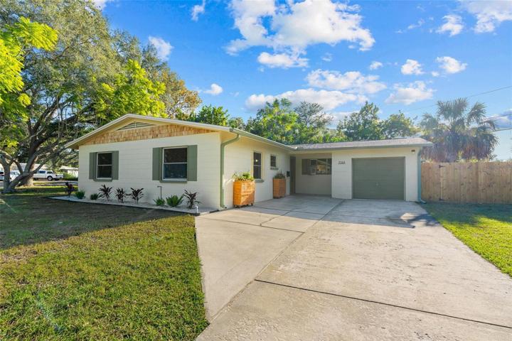 Nestled in the heart of St. Petersburg on an oversized, corner lot.