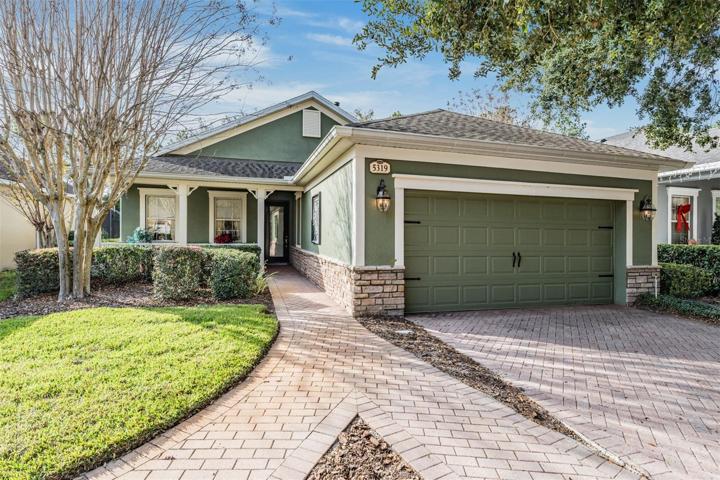 Paver walkway, driveway and front porch welcome you HOME!