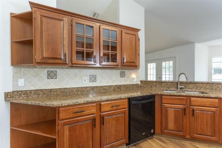 Loads of storage plus awesome prep space on brand new granite!