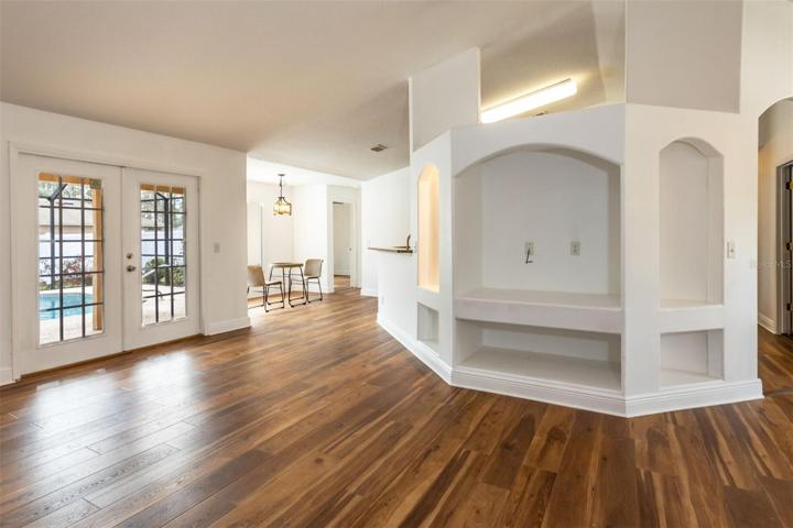 Spacious Living Room, Open floor paln with handsome custom built-ins for person displays and televised & stereo storage.