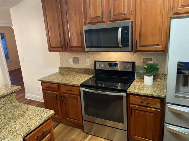 Newer appliances and brand new stainless steel refrigerator