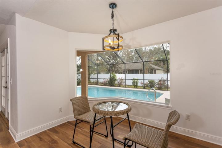 Breakfast area with view of pool through your Mitered Window!