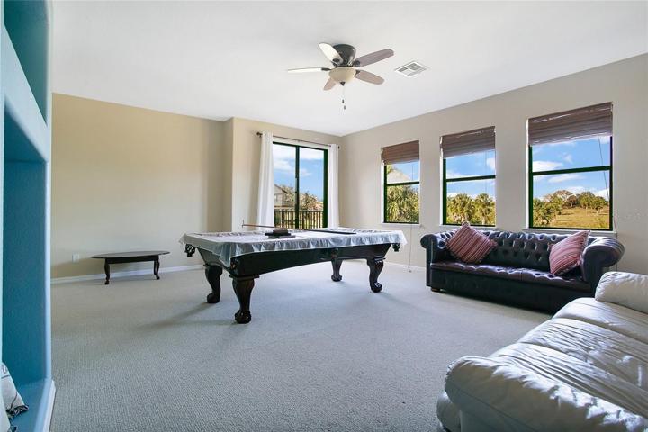 Upstairs Game Room with direct access to large balcony.