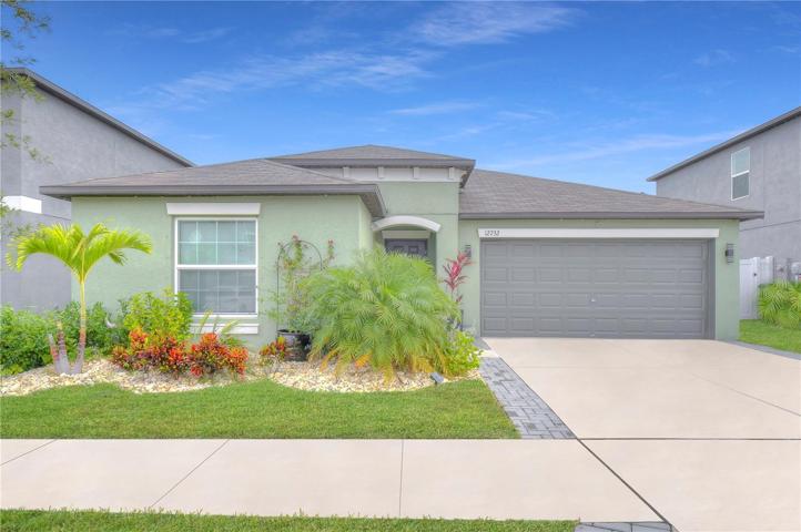 Gorgeous home in desirable TRIPLE CREEK VILLAGE!
