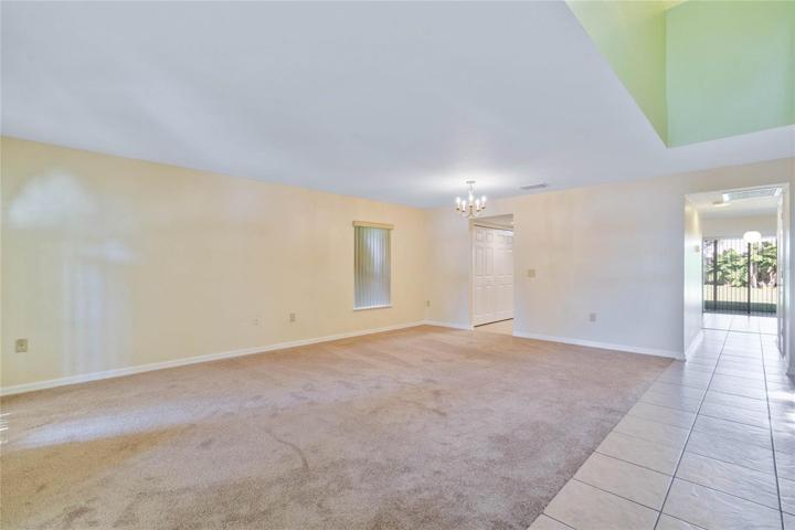 View of Living/Dining room combo from entrance.