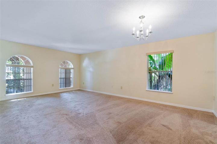 View of the living/dining room combo from the kitchen area.