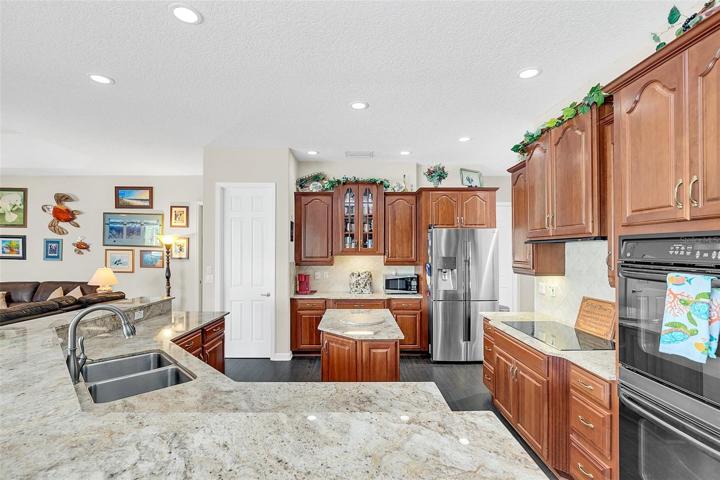 STONE COUNTERS AND WOOD CABINETS