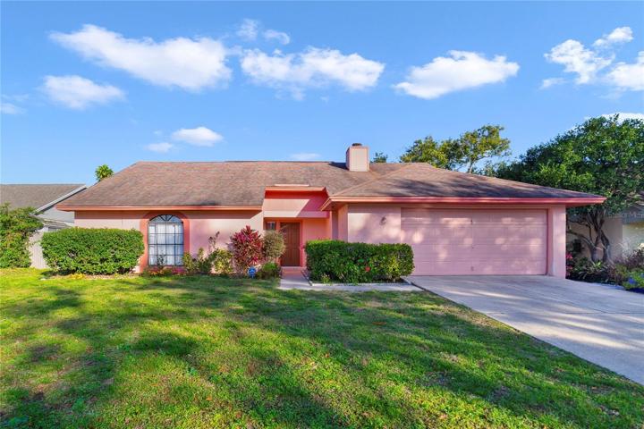 Welcome to Oviedo’s Alafaya Woods community and this beautiful 3BD/2BA home on a spacious fenced lot with easy care TILE FLOORS in all your main living areas, HIGH CEILINGS, a light and bright flowing floor plan and NO REAR NEIGHBORS!