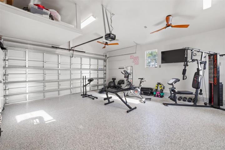 Awesome 2 car garage with laundry and work out equipment