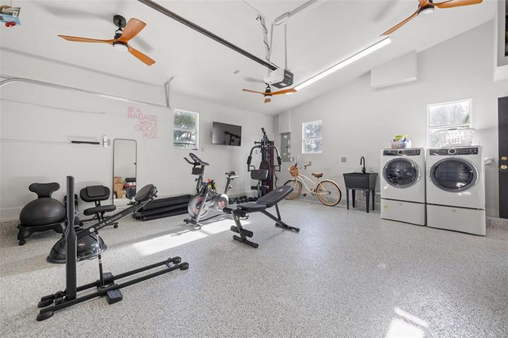 Awesome 2 car garage with laundry and work out equipment