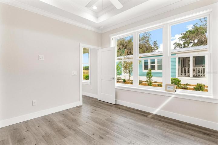 Bedroom with Laminate Plank Flooring