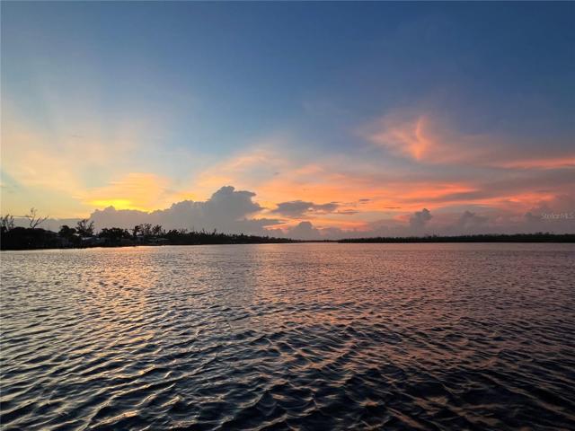 Sunset blushed sky from the bay
