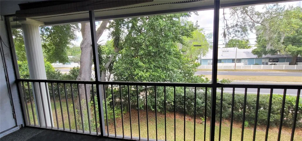 Shaded view of your private screened porch  from Bedroom 1