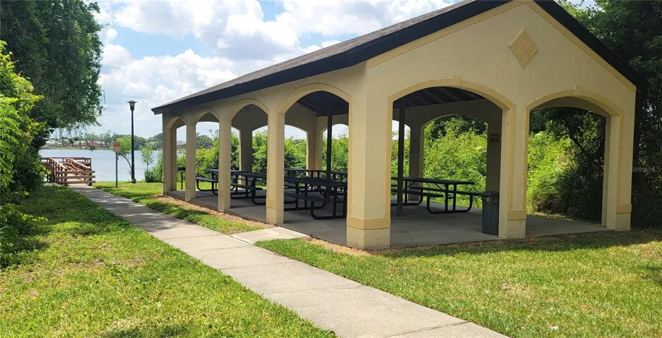 COMMUNITY AMENITIES: Shady picnic pavilion and pretty lake views of Lk Fredrica
