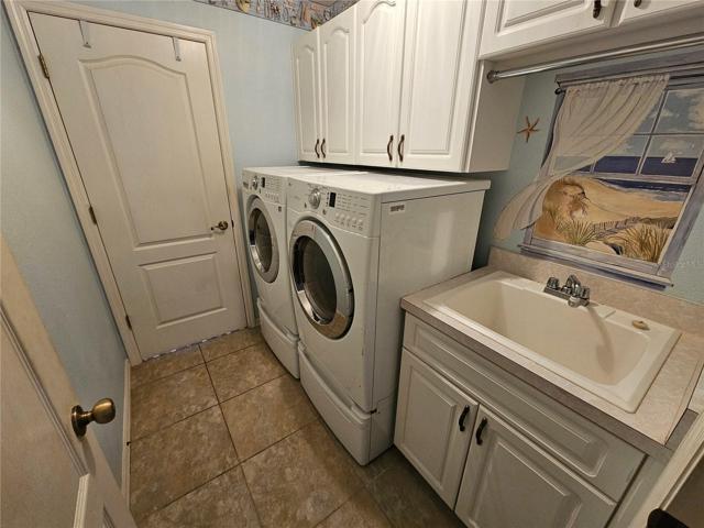Laundry room with sink