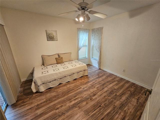 2nd bedroom with sliding glass door to pool