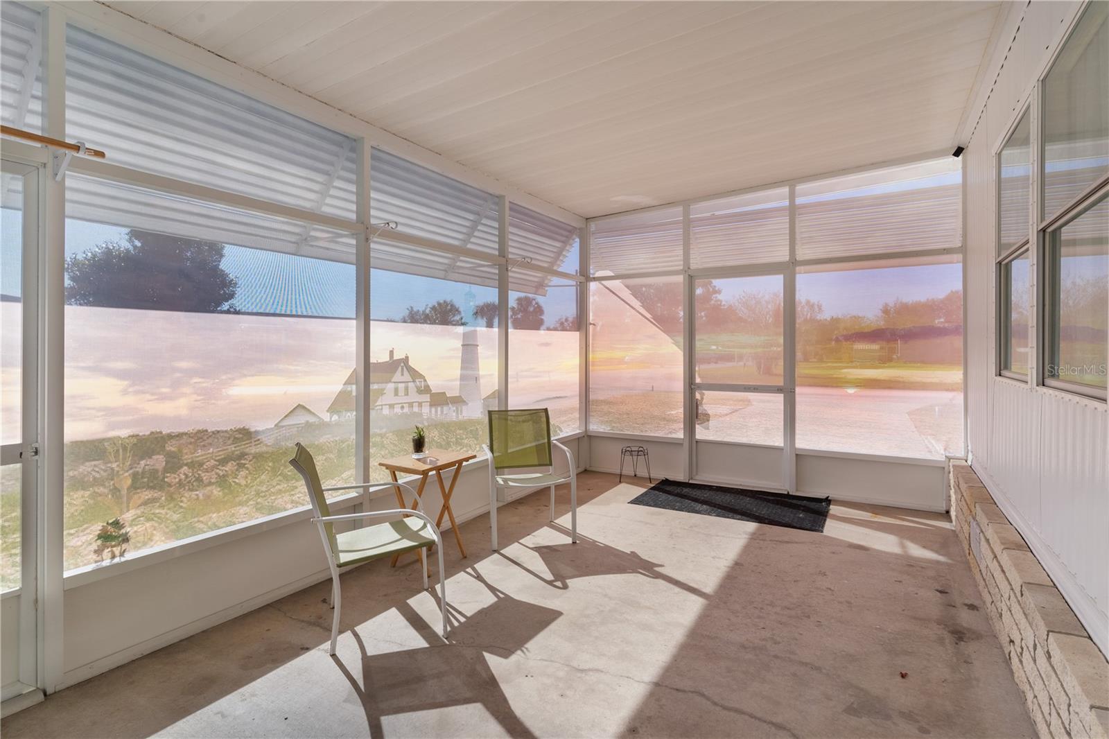 Screened Porch with daytime view of screens