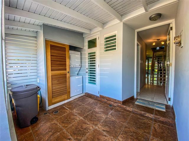 Back patio with laundry closet.