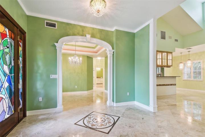 Custom archway leads to dining room