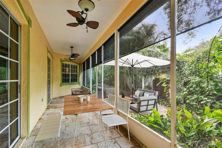 Travertine covered patio;digitally staged.