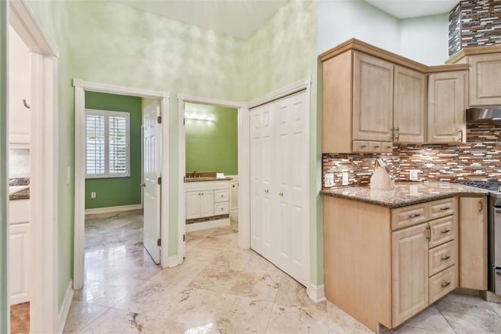 Pantry, guest bath, bedroom / office entrance and laundry.