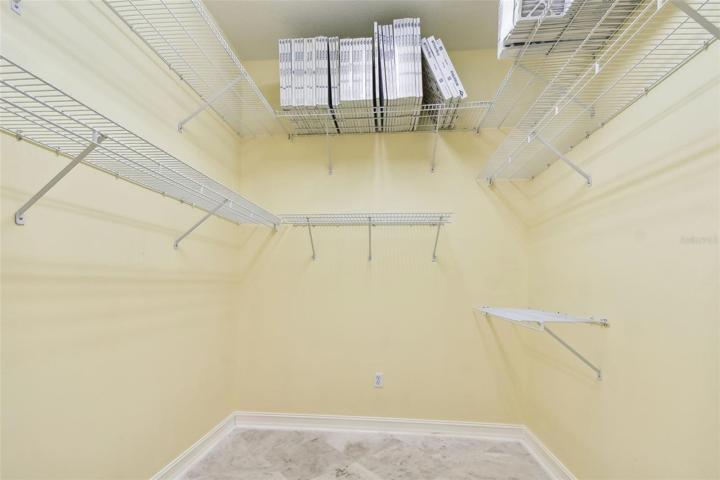 Spacious walk-in closet with in-law quarters