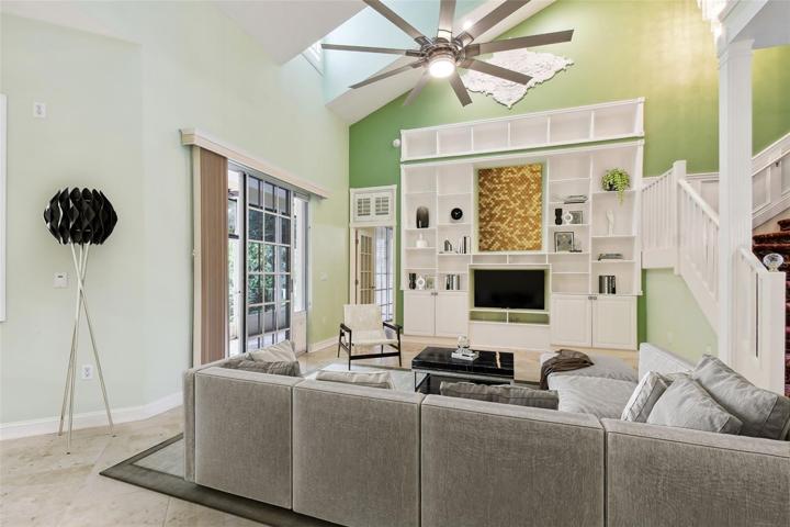 Great room; digitally staged.