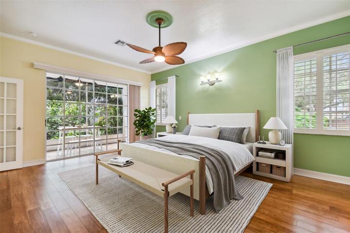 Primary bedroom; digitally staged.