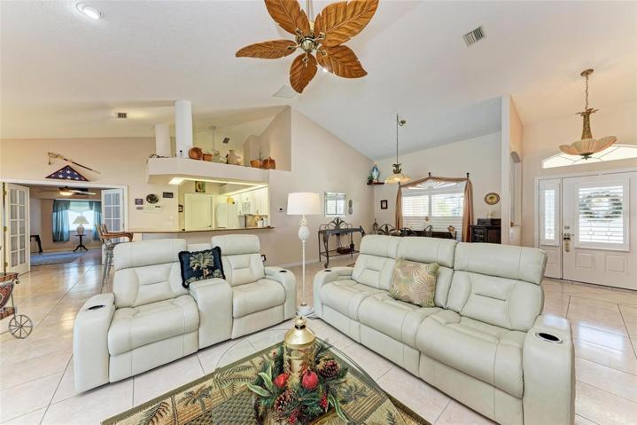 Family Room view to the Kitchen/Breakfast Bar/Dng Room/Foyer & Flex Space Office/Guest Bedroom/Man Cave