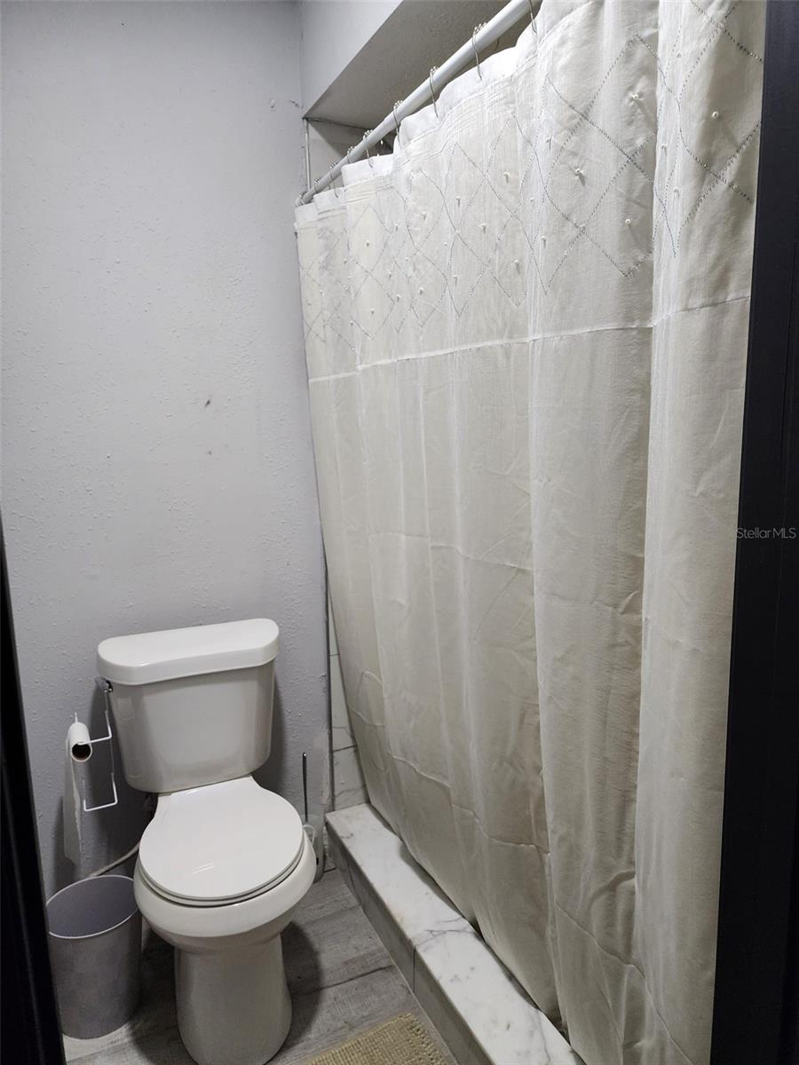 2nd floor master bedroom shower and toilet