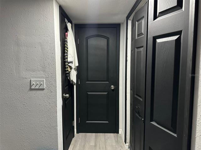 Look from the bed towards the bathroom and 2 upstairs master closets
