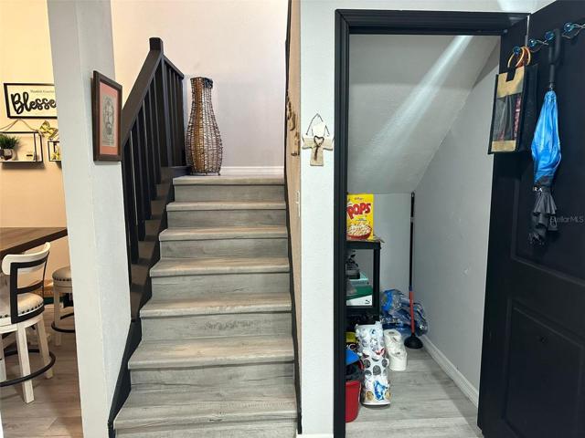 Stairs to the second room and bathroom- Door to the right is under the stairs pantry
