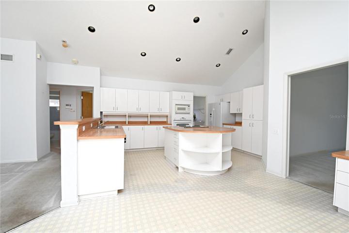 The kitchen has a great layout with plenty of cabinet and counter space.