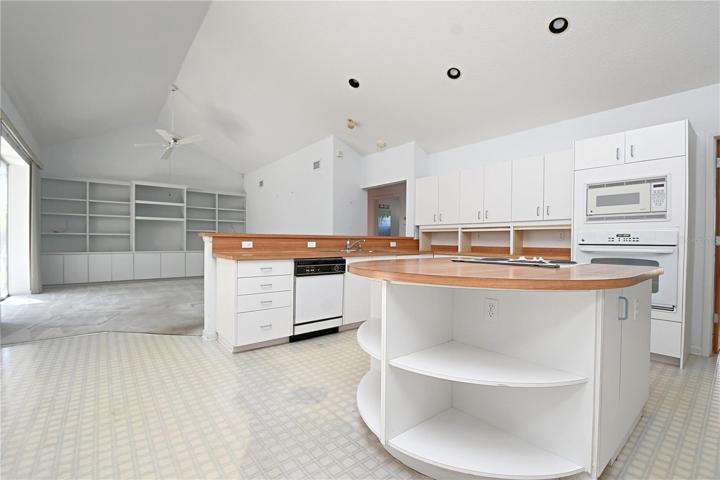 The kitchen effortlessly flows into the family room.