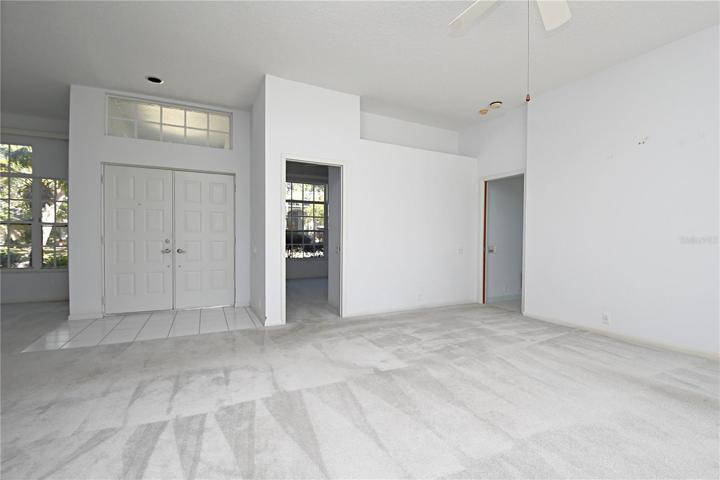 Double entry  doors open into the living room.