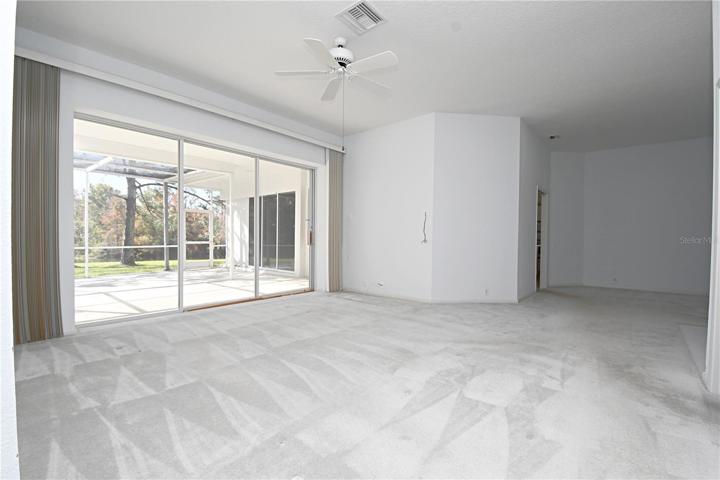 The spacious living room measures approx. 17' x 17'