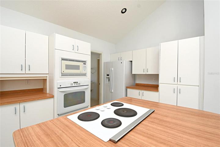 The large kitchen island is ideal for prep work and your cooktop.